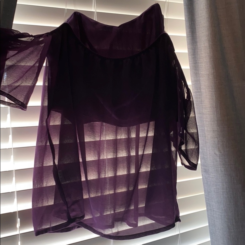 Purple sleeveless blouse